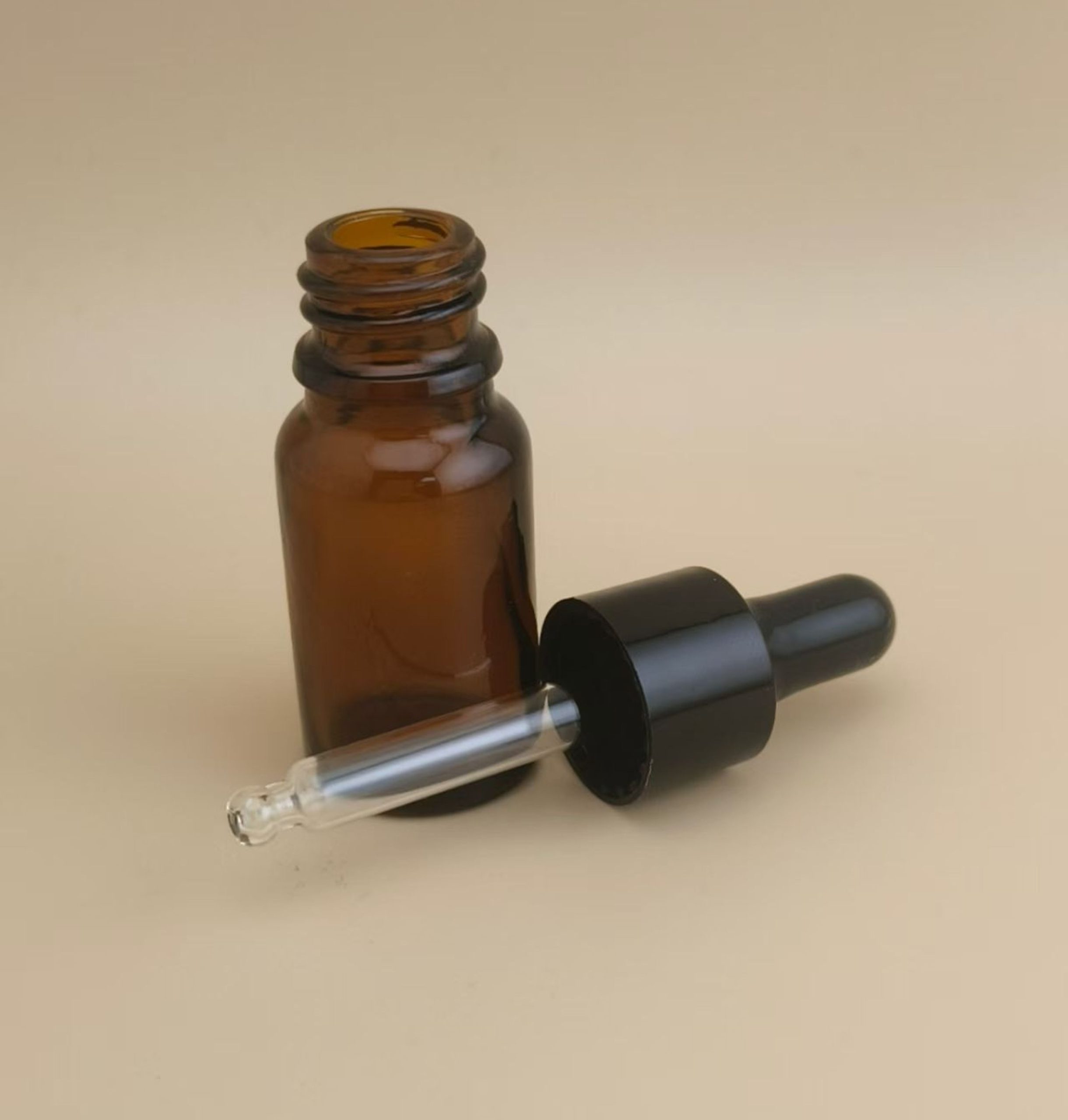 Delicate Design Mini Clear Brown Smooth Round Dropper Bottle for Skincare - Image 4