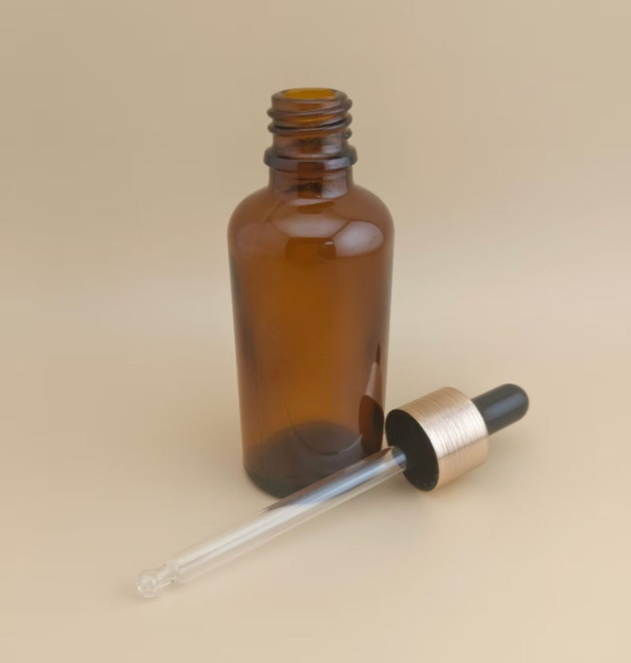 Delicate Design Medium Clear Brown Smooth Round Dropper Bottle for Skincare - Image 2