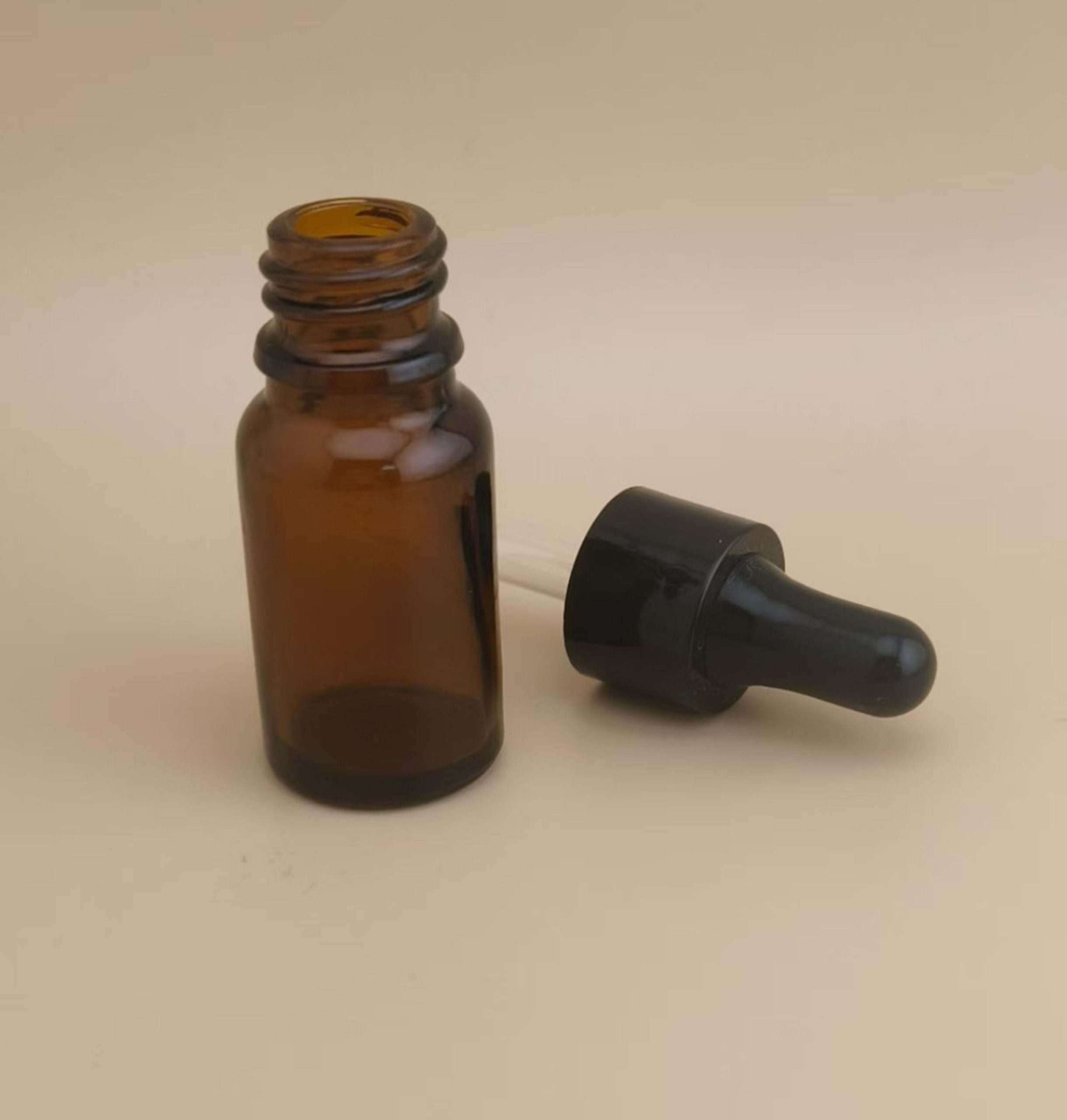 Delicate Design Mini Clear Brown Smooth Round Dropper Bottle for Skincare - Image 3
