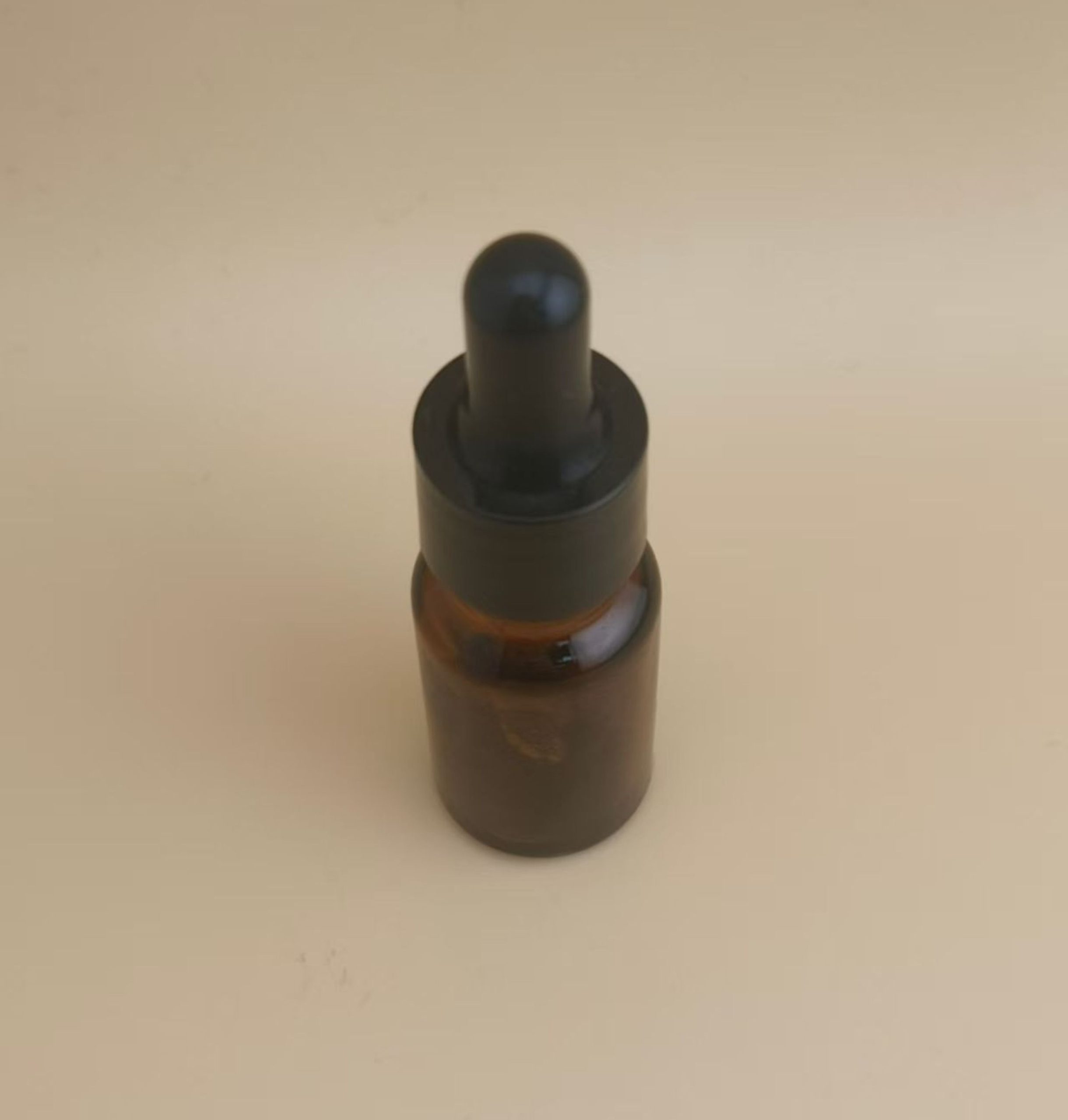 Delicate Design Mini Clear Brown Smooth Round Dropper Bottle for Skincare - Image 2