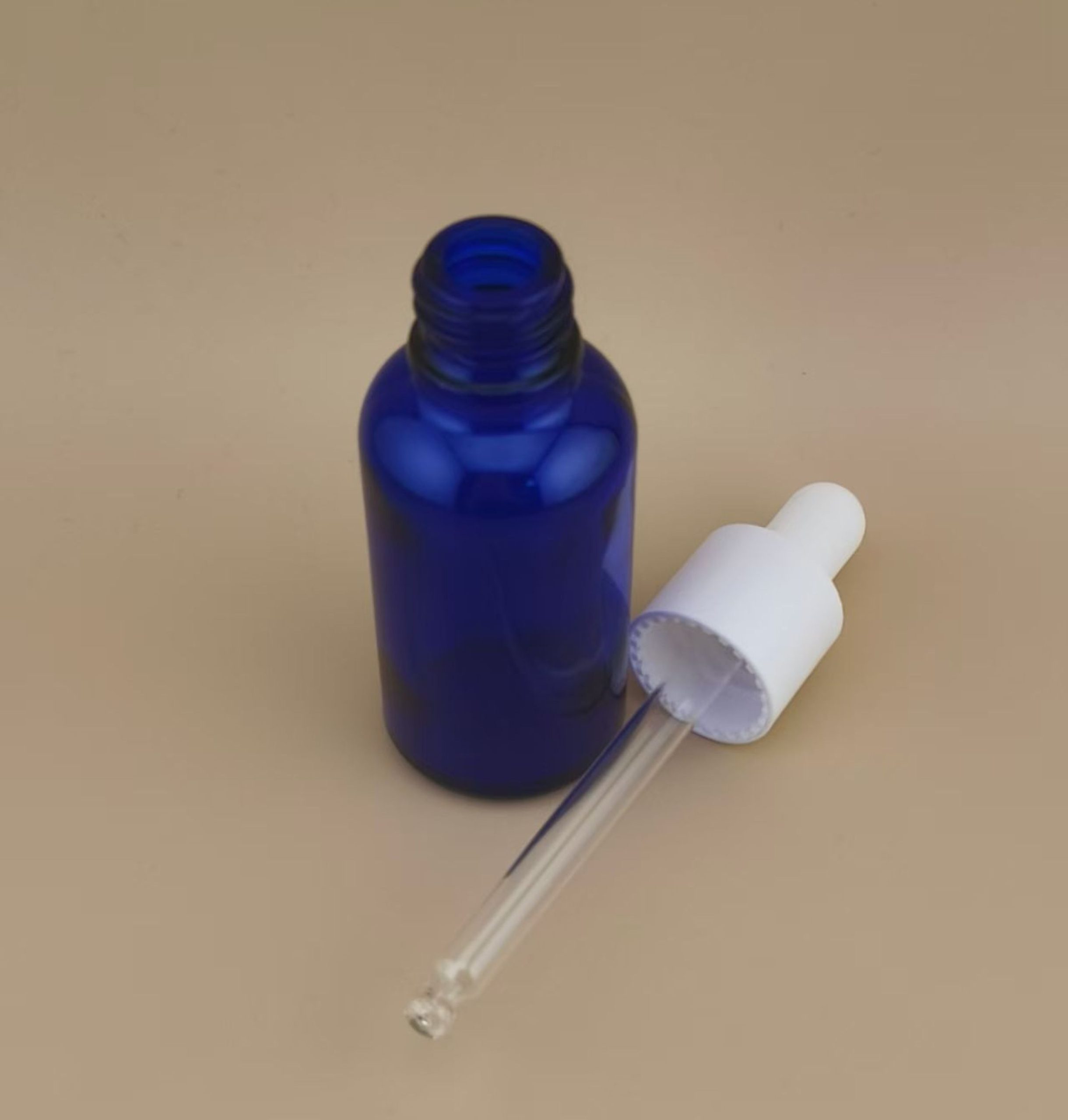 Delicate Design Clear Dark Blue Smooth Round Dropper Bottle for Skincare - Image 3