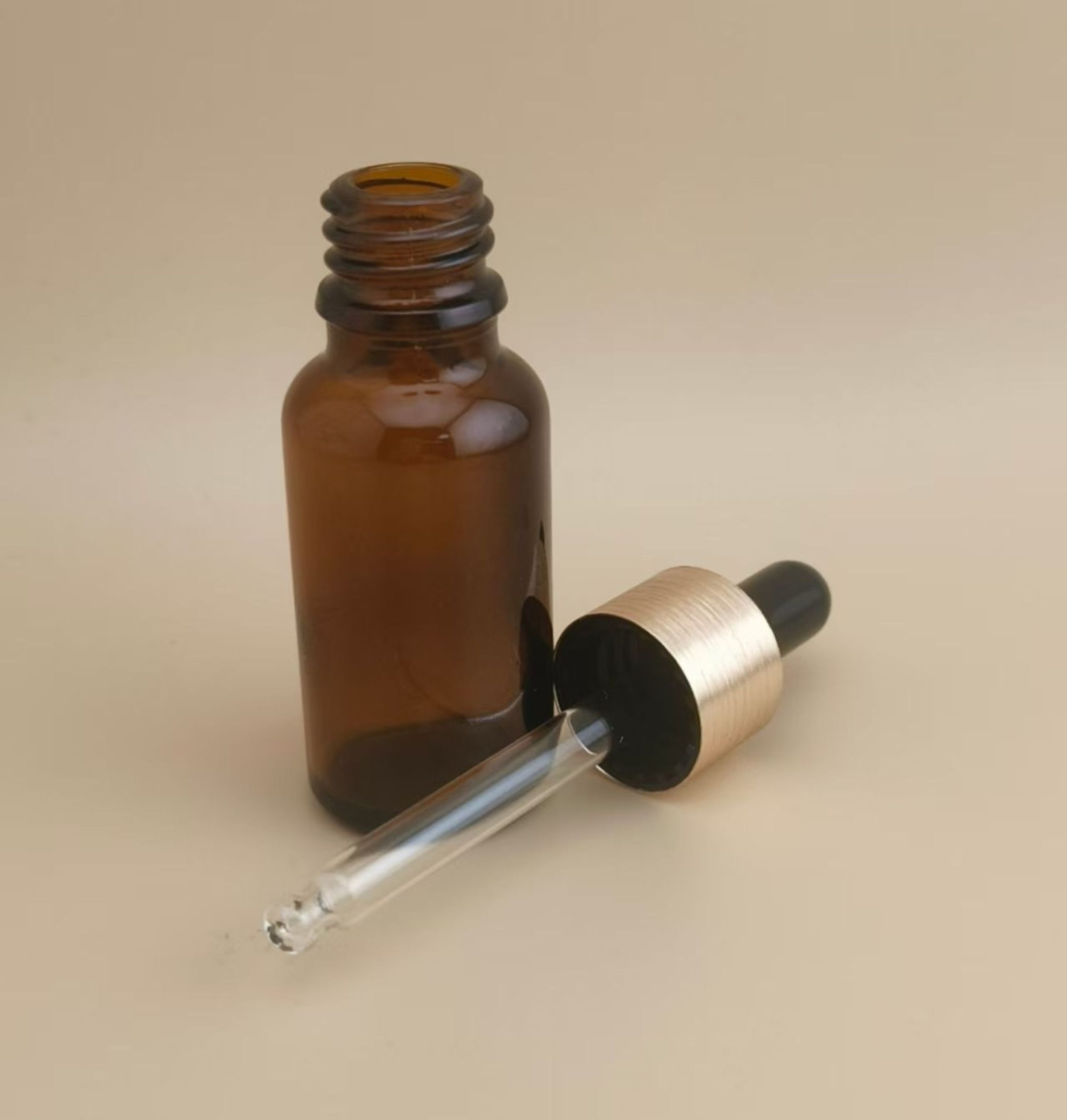 Delicate Design Small Clear Brown Smooth Round Dropper Bottle for Skincare - Image 4